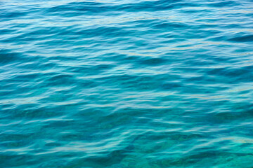 Fototapeta premium Abstract background with transparent turquoise shallow sea water waving