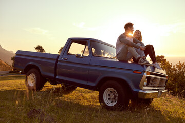 Can I kiss you. Shot of an affectionate young couple on a roadtrip. © Anne B/peopleimages.com