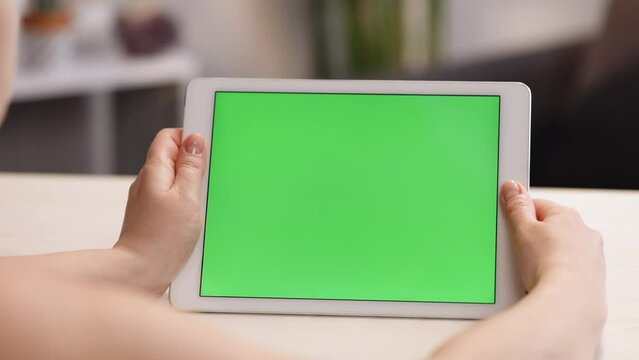 Tablet Computer with Green Screen and Chroma Key for Copy Space. Chromakey Mock Up with Modern Device. Business Woman Holding Mobile PC Close-Up. Office Worker Shopping at Web Store or Working on Pad.