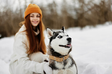 woman with dog outdoor games snow fun travel Lifestyle