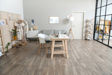 Interior of modern studio of clothes stylist