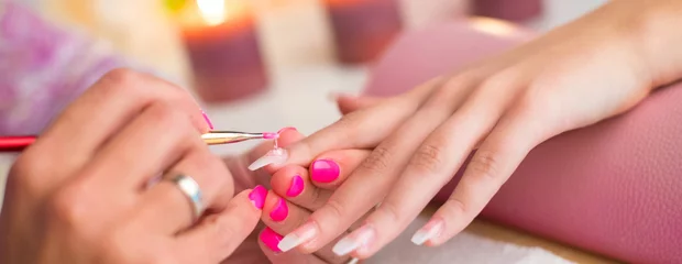 Wall murals Manicure Manicure process in beauty salon, making of artificial nails