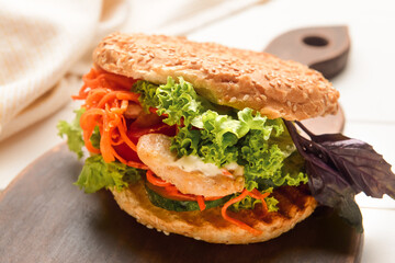 Fresh doner kebab in bun on table, closeup