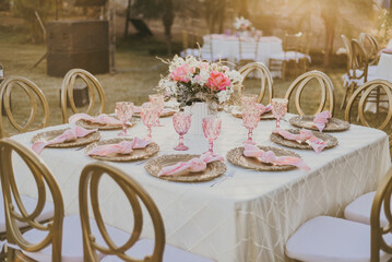 wedding table setting decoration on sunset day
