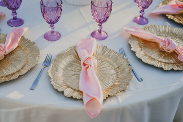 seashells plate on a table and purple cups