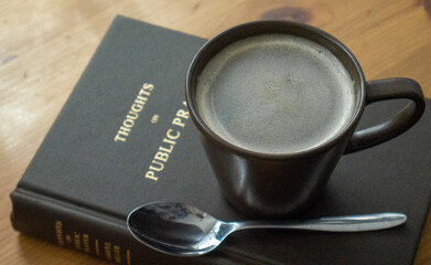 cup of brown coffee