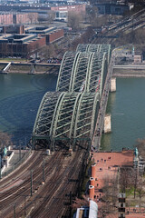 View on Hohenzollern railway bridge from the Tower of Cologne Cathedral, Germany - 497610330