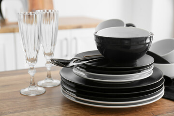 Set of clean tableware in  kitchen