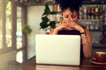 Some things just arent meant to work out. Cropped shot of a young woman looking stressed out while...