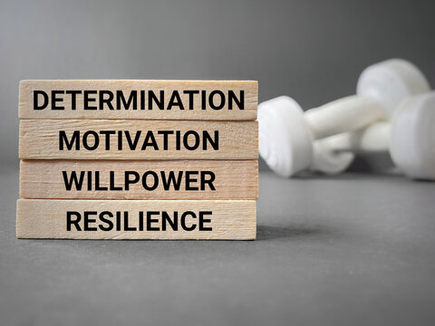 Inspirational and motivational words of determination motivation willpower resilience. Stock photo.