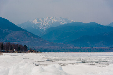 Day at Baikal Lake. Spring floating of ice