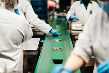 Workers working inside a factory