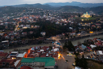 Evening top view of the historic city of Kutaisi, located on the two banks of the Rioni River, Georgia