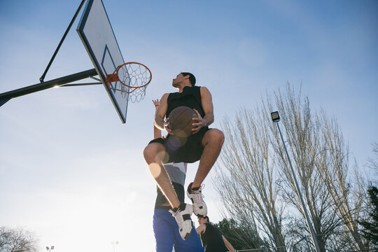 Players on basketball sports ground 
