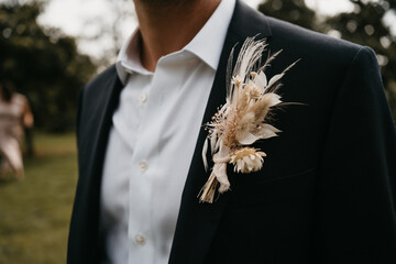 Groom with floral corsage