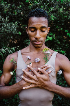 Portrait of expressive male dancer in nature 