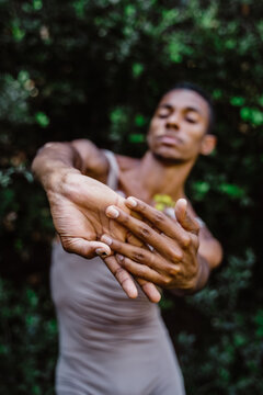 Portrait of expressive male dancer in nature 