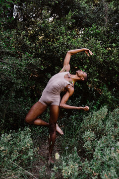 Portrait of expressive male dancer in nature 