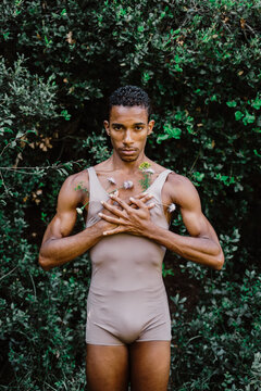 Portrait of expressive male dancer in nature 