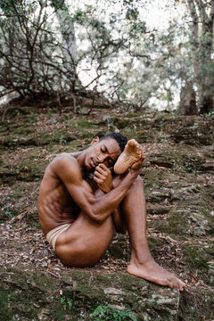 Portrait of expressive male dancer in nature 