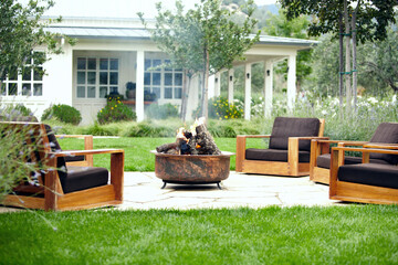 Architecture image of outdoor resort lounge fire pit in courtyard 