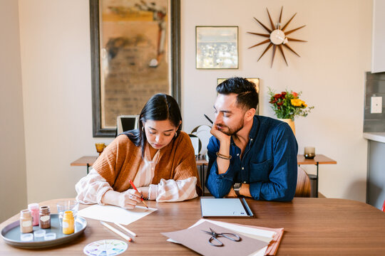 Designers couple working together at home