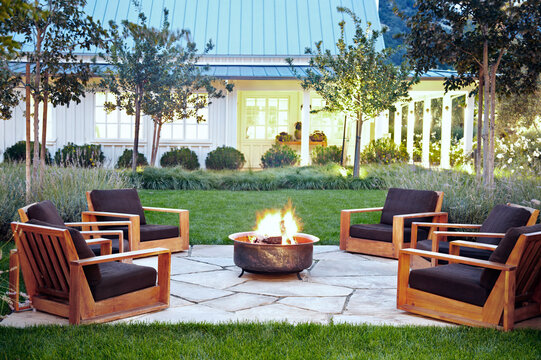 Dusk architecture shot of outdoor lounge fire pit