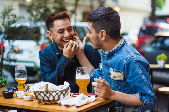 Gay latino couple being cute on a date