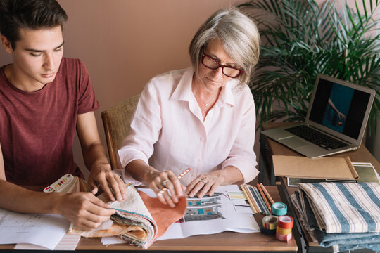 Fashion Designers Decinding On Textile Swatches 