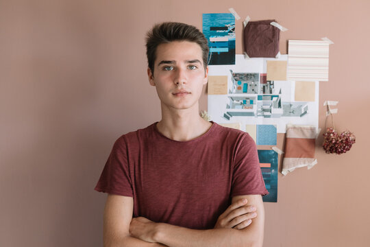 Young Designers In Front Of Colorful Vision Board
