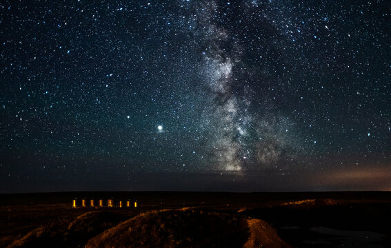 summer milky way over railway station