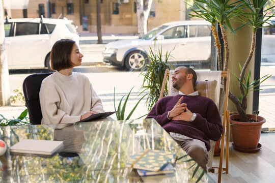Male patient having therapy session with sexologist