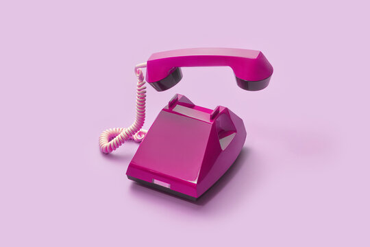 Classic violet telephone with taken handset