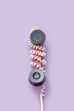 Handset from vintage telephone with white cable
