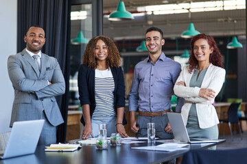 The team to can trust. Cropped portrait of a group of young businesspeople standing in the...