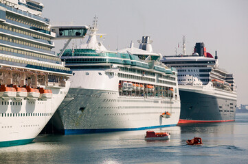  Cruise Ships in Port doing lifeboat safety drill 