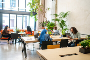 Group Of Business Colleagues Working In The Office.