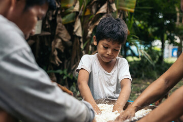 Little boy preparing the farina