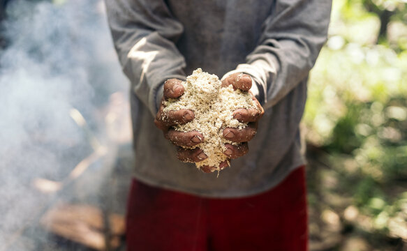 Peruvian man preparing the farina