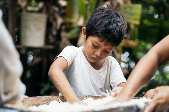 Little boy preparing the farina