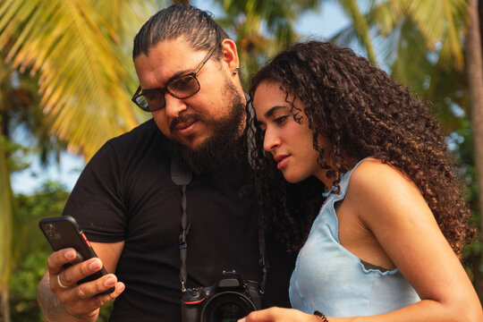 Couple browsing through cellphone