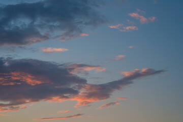 Fototapeta premium Texture of a red blue sky at sunset after rain