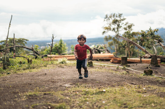 Native little boy from Panama playing and running
