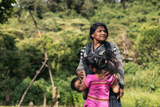 Native woman with her grandchildren