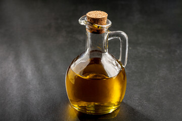 Glass cruet. Olive oil in a glass cruet.