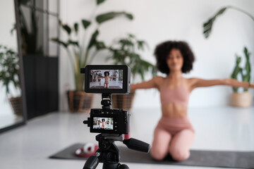 camera recording a fitness instructor