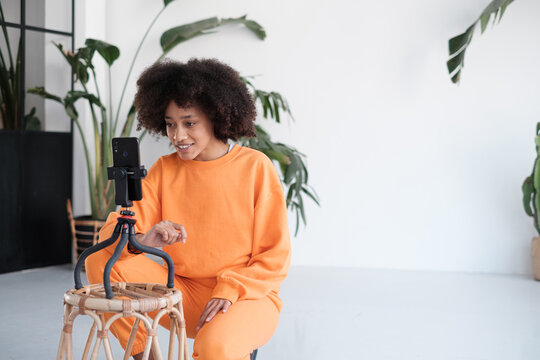 Young woman Live Streaming by phone
