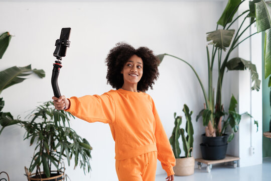 Young woman Live Streaming by phone
