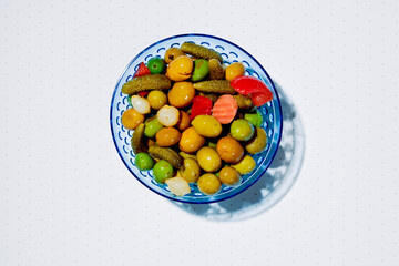 spanish olives and pickles in a bowl