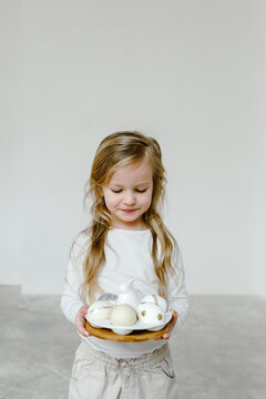 Child with Easter eggs